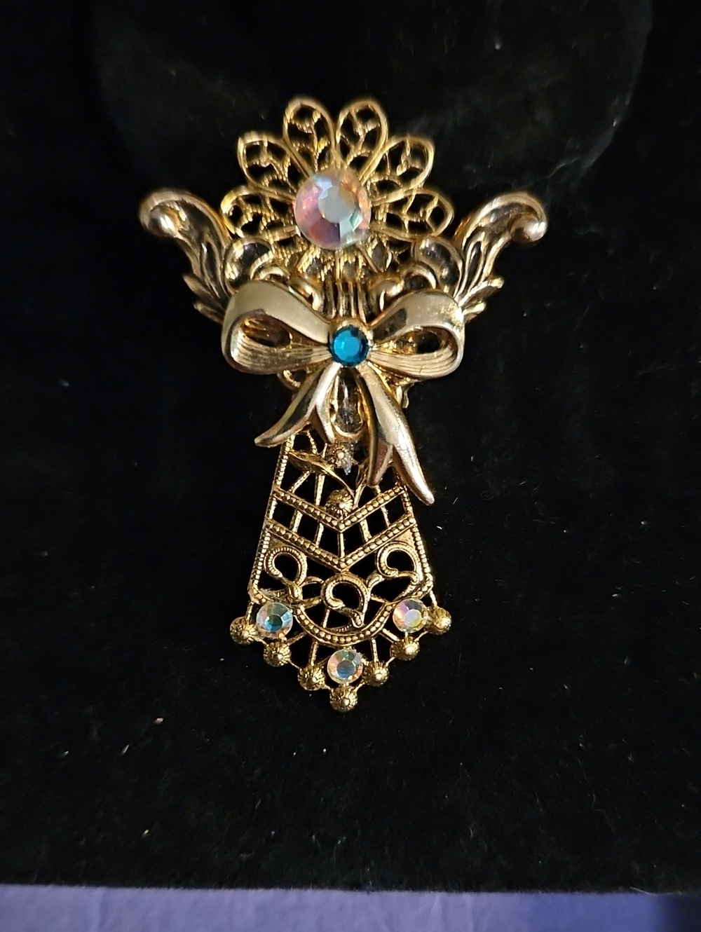 Gold-Tone Filigree Bow Brooch with Aurora and Blue Rhinestones